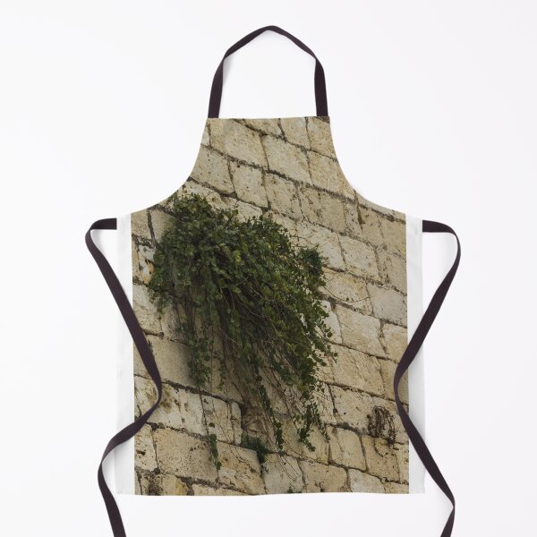 Item preview, Old Stone Wall With Hanging Green Plant Creating Rustic Charm And Natural Texture designed and sold by Nmallia.