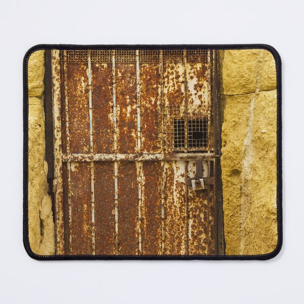 Item preview, Abandoned Doorway In Yellow Wall With Rusted Gate And Debris On The Sidewalk designed and sold by Nmallia.