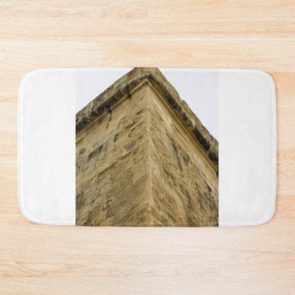 Item preview, Corner Of Historic Stone Building: Close-Up Of Beige Masonry And Roofing Detail designed and sold by Nmallia.