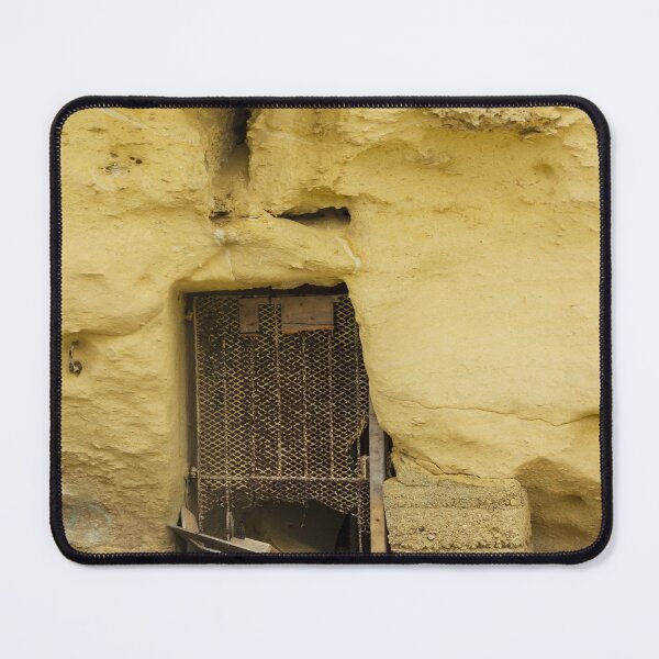 Item preview, Abandoned Doorway In Yellow Wall With Rusted Gate And Debris On The Sidewalk designed and sold by Nmallia.