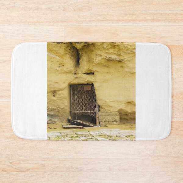Item preview, Abandoned Doorway In Yellow Wall With Rusted Gate And Debris On The Sidewalk designed and sold by Nmallia.