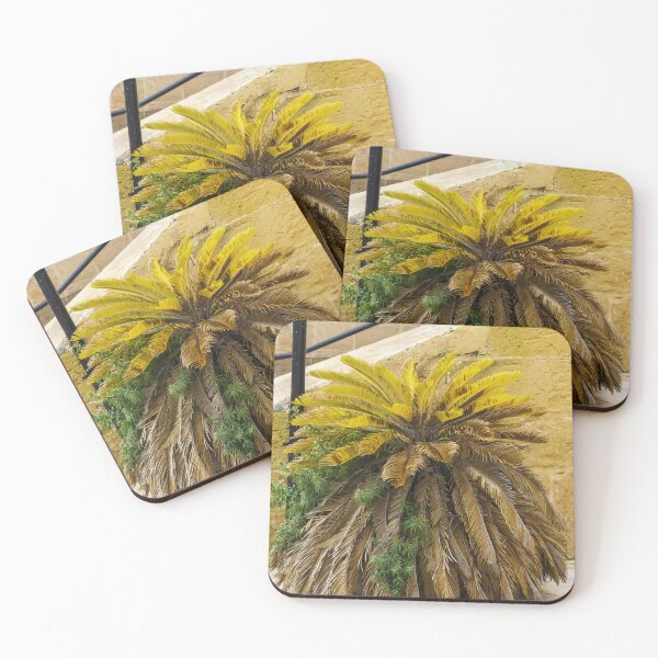 Item preview, Yellow Palm Fronds Grow From A Foliage Bush Beside A Stony Staircase Wall designed and sold by Nmallia.