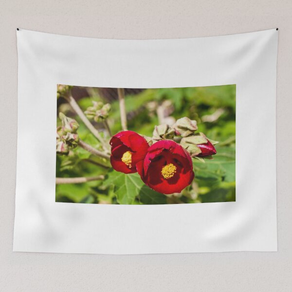 Item preview, Bright Red Hibiscus Flowers With Yellow Centers In Green Garden Setting designed and sold by Nmallia.