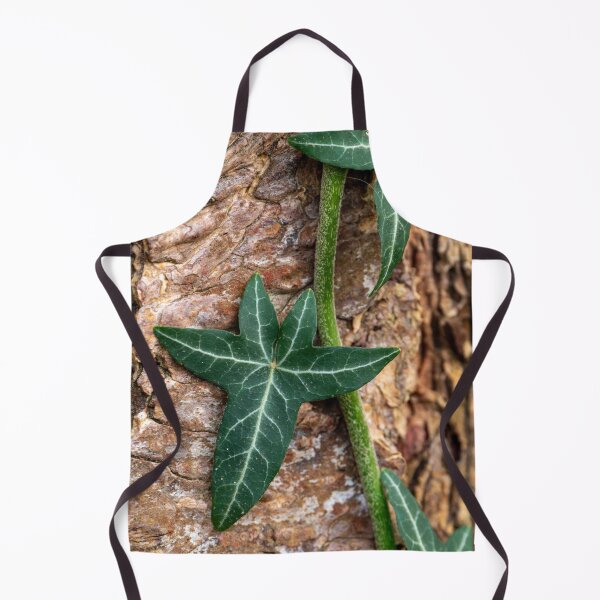Item preview, Close-up of ivy leaves creeping up a tree trunk designed and sold by lisavonbiela.