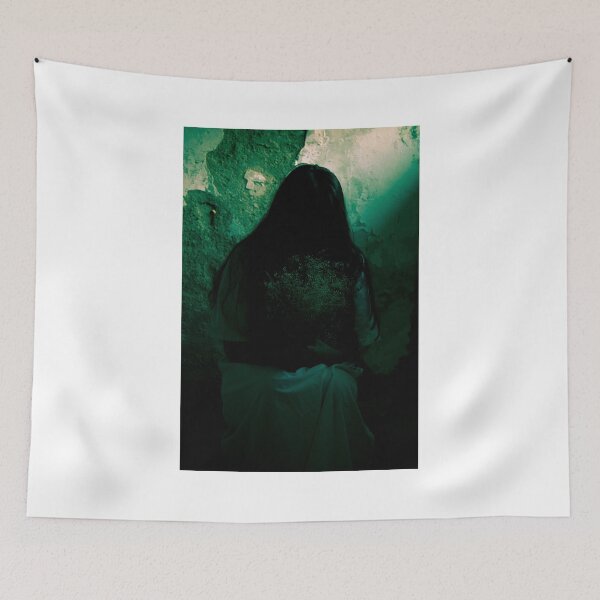 Item preview, A solitary figure sits in shadow, her face hidden behind cascading dark hair, clutching a fragile bouquet against a crumbling wall. designed and sold by grande76.