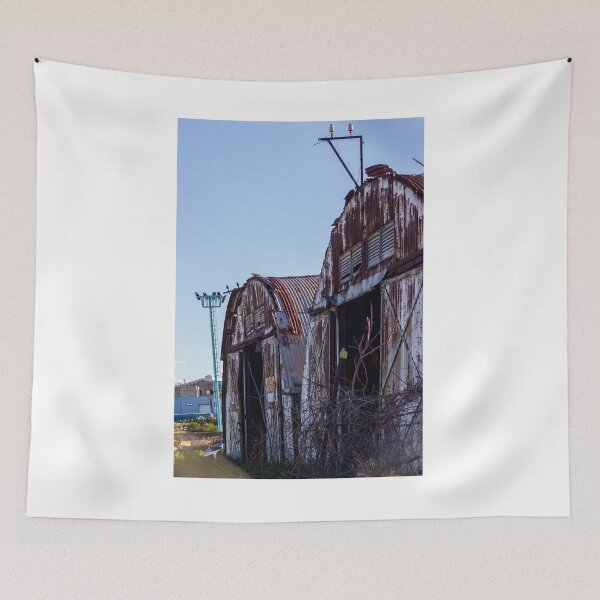 Item preview, Rusted Abandoned Barn-Industrial Shed With Weathered Metal Exterior Under Clear Blue Sky designed and sold by Nmallia.