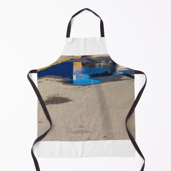 Item preview, Puddle On Wet Road Surface Reflects Buildings In Bright Urban Street Scene designed and sold by Nmallia.
