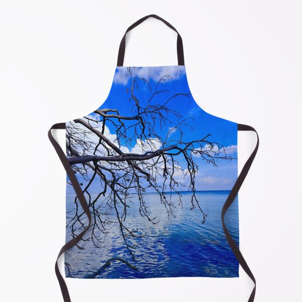 Item preview, Fallen tree on a natural beach of the Baltic Sea designed and sold by GoldenWavesAndWilds.
