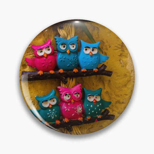 Item preview, Colorful Decorative Owl Figurines Hanging outside on a Yellow Textured Wall designed and sold by Nmallia.