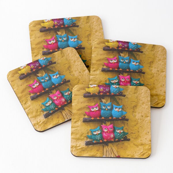 Item preview, Colorful Decorative Owl Figurines Hanging outside on a Yellow Textured Wall designed and sold by Nmallia.