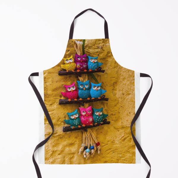 Item preview, Colorful Decorative Owl Figurines Hanging outside on a Yellow Textured Wall designed and sold by Nmallia.
