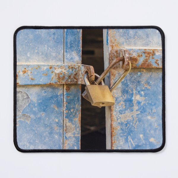 Item preview, Rusty Blue Door With Padlock and Locking Bar in Abandoned, Weathered Building Entrance designed and sold by Nmallia.