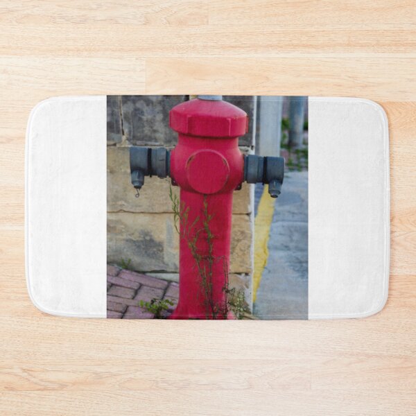 Item preview, Red Fire Hydrant Stands Boldly On City Sidewalk Against Gray Wall, Creating Striking Urban Contrast designed and sold by Nmallia.