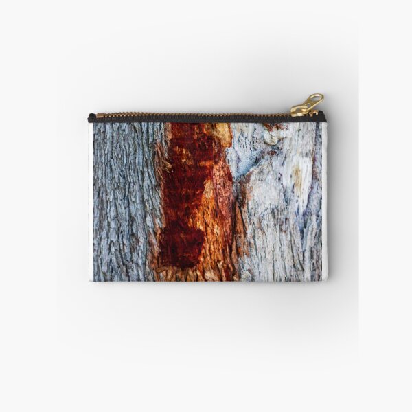 Item preview, Close-Up Of Weathered Tree Bark With Red Rust Color Peeling Across The Surface designed and sold by Nmallia.
