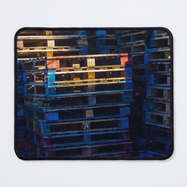 Item preview, Colorful Stacked Wooden Pallets in an Industrial Yard Creating Vibrant Urban Warehouse Atmosphere and Texture designed and sold by Nmallia.