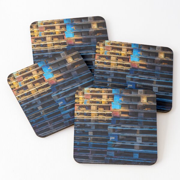 Item preview, Colorful Stacked Wooden Pallets in an Industrial Yard Creating Vibrant Urban Warehouse Atmosphere and Texture designed and sold by Nmallia.