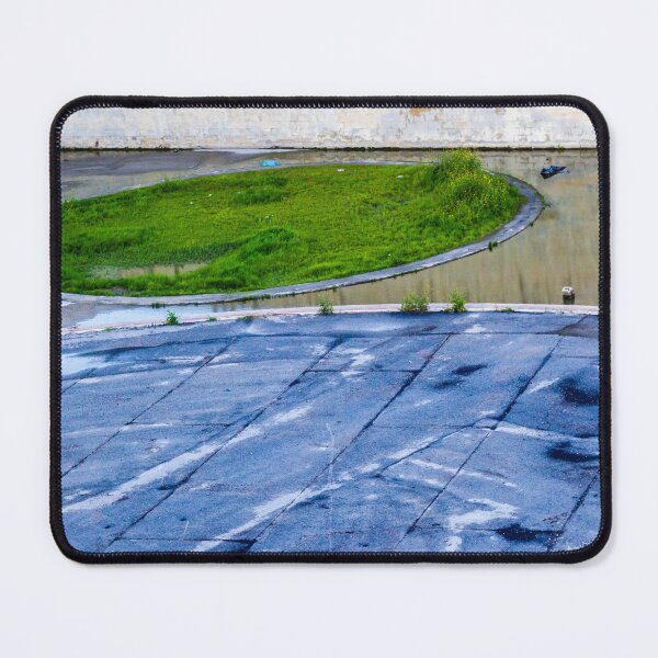 Item preview, Abandoned Parking Lot With Circular Green Island And Wet Paved Surface For Stock Use designed and sold by Nmallia.