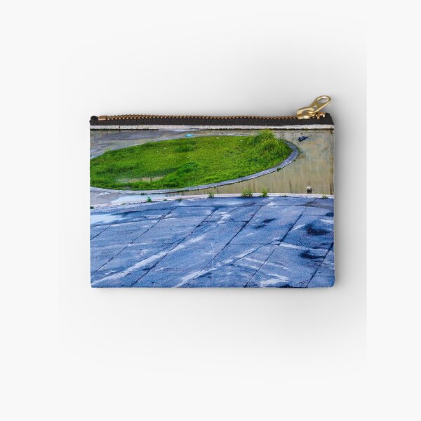 Item preview, Abandoned Parking Lot With Circular Green Island And Wet Paved Surface For Stock Use designed and sold by Nmallia.