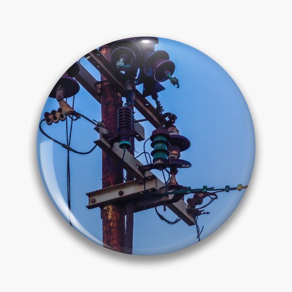 Item preview, Rusty Electrical Power Pole With Insulators Against Clear Blue Sky at Sunset designed and sold by Nmallia.