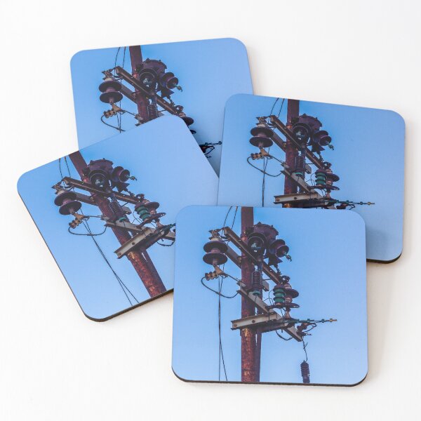 Item preview, Rusty Electrical Power Pole With Insulators Against Clear Blue Sky at Sunset designed and sold by Nmallia.