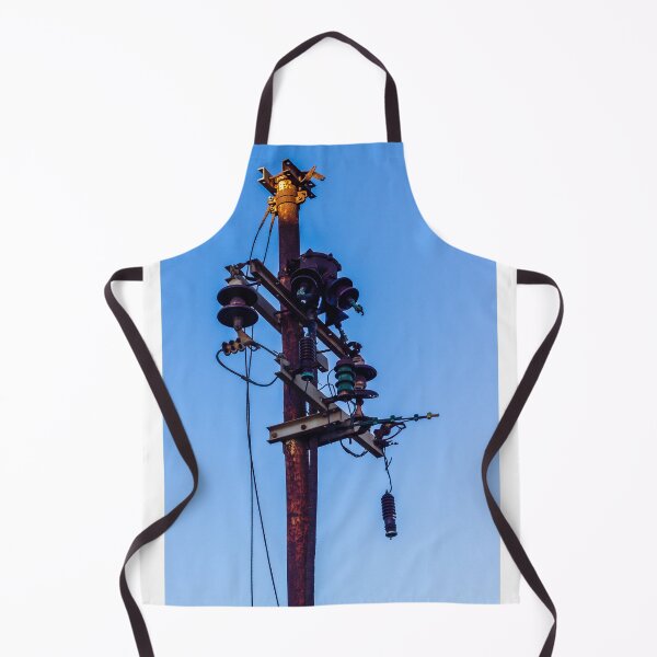 Item preview, Rusty Electrical Power Pole With Insulators Against Clear Blue Sky at Sunset designed and sold by Nmallia.