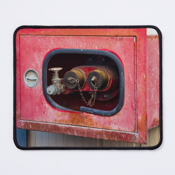 Item preview, Red Fire Hose Cabinet on Exterior Wall With Rusty Vintage Industrial Look designed and sold by Nmallia.