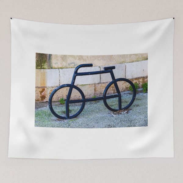 Item preview, Minimalist Black Metal Bicycle Sculpture Resting Against a Stone Wall in an Outdoor Space designed and sold by Nmallia.