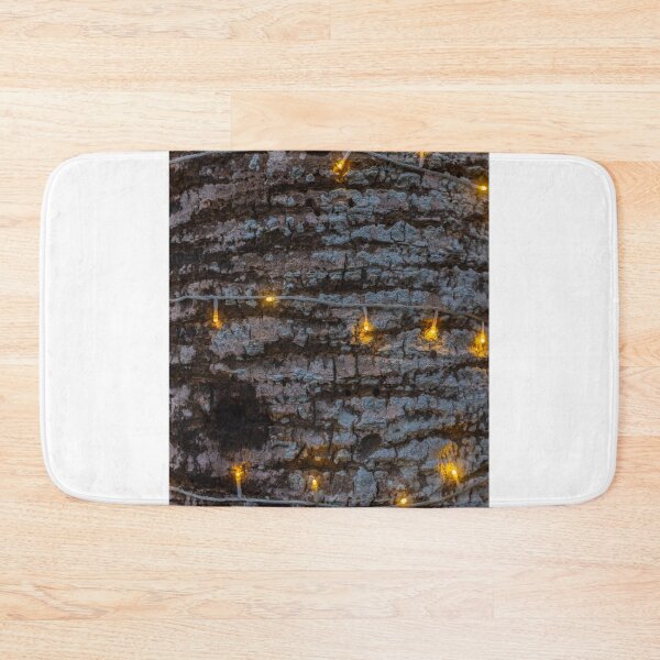 Item preview, Warm String Lights Cast Cozy Glow Across Rough Stone Wall For Rustic Festive Ambience designed and sold by Nmallia.