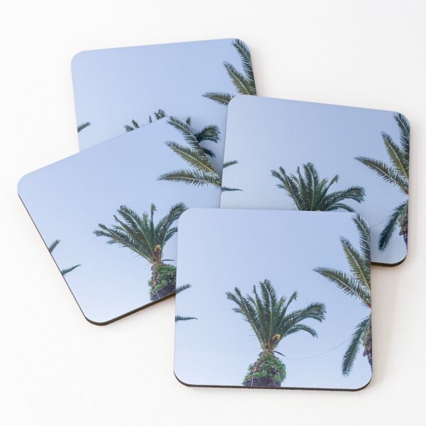 Item preview, Three Tall Palm Trees Standing Against Clear Blue Sky Creating a Serene Tropical Scene designed and sold by Nmallia.