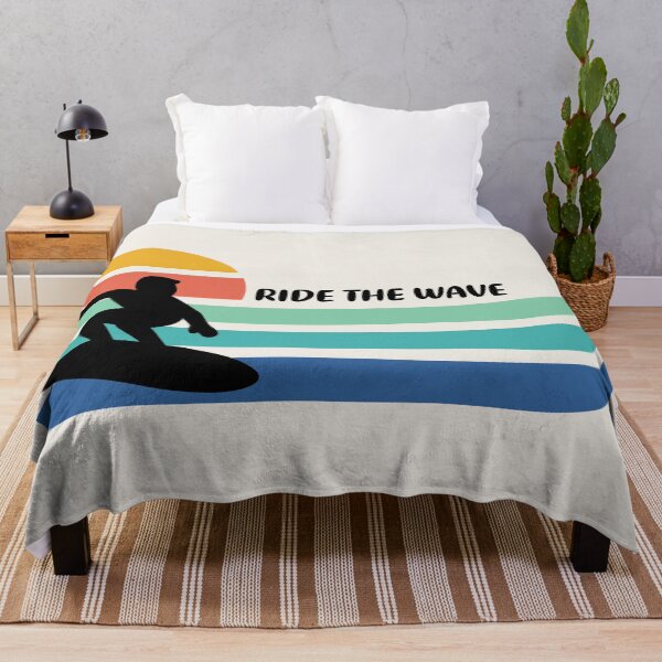 Item preview, Surfer silhouette riding a wave with a stylized sunset and Ride the Wave text designed and sold by AtonuHaque.