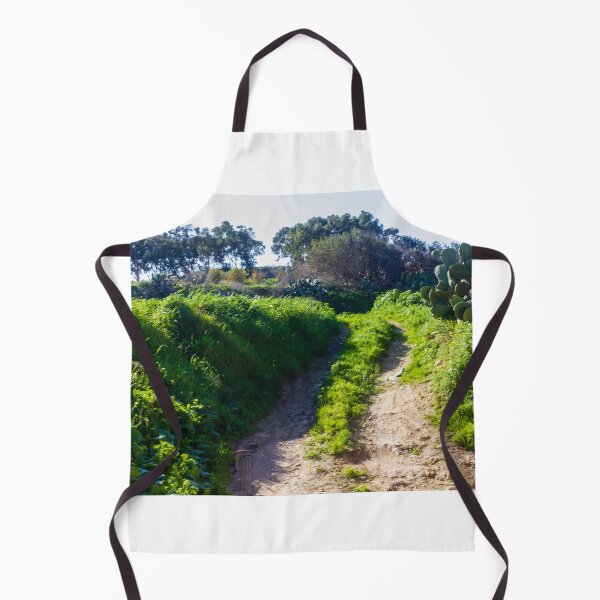 Item preview, Rural Dirt Path Through Lush Green Field With Cactus and Stone Wall Under Clear Sky designed and sold by Nmallia.