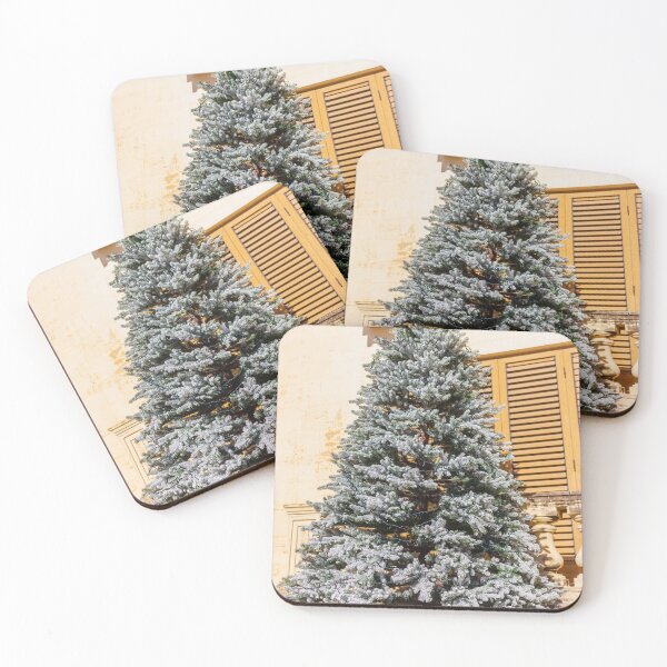 Item preview, Frosted Christmas Tree Outdoors Against a Classic Stone Building With Wooden Shutters designed and sold by Nmallia.