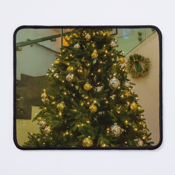 Item preview, Elegant Christmas Tree Decorated With Gold And Silver Ornaments And Twinkling Lights In Modern Home Setting designed and sold by Nmallia.