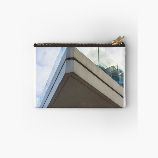 Item preview, Modern Concrete Building Corner With Glass Railing Against Sky Backdrop, Dramatic Perspective View, Architectural Detail designed and sold by Nmallia.