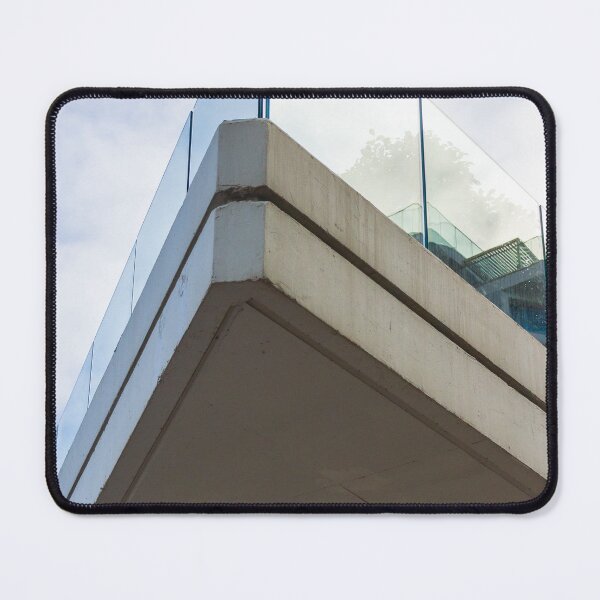 Item preview, Modern Concrete Building Corner With Glass Railing Against Sky Backdrop, Dramatic Perspective View, Architectural Detail designed and sold by Nmallia.