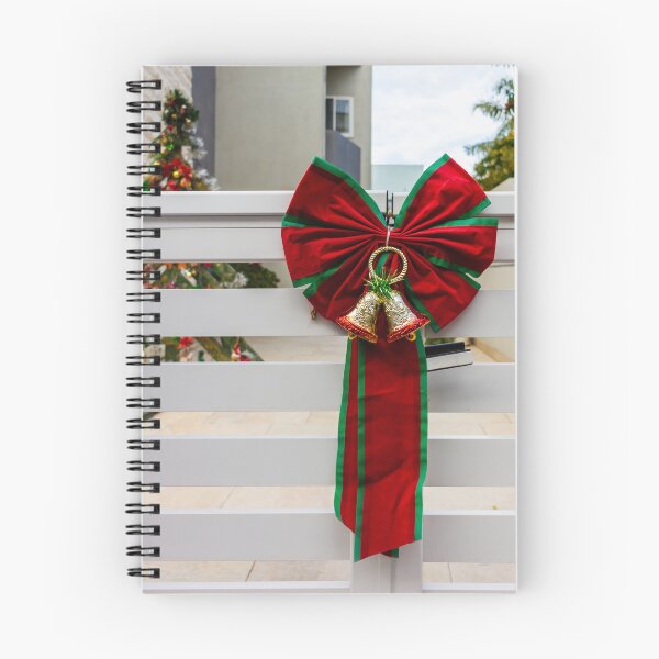 Item preview, Christmas Bow With Red and Green Ribbon and Golden Bells Adorns White Fence designed and sold by Nmallia.
