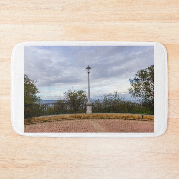 Item preview, Scenic Sea View From a Brick Terrace With Classic Lamp Post and Ocean Horizon designed and sold by Nmallia.