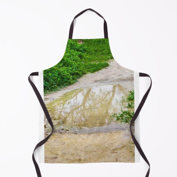 Item preview, Muddy Path With Puddle Reflection Along Lush Green Grass and Wildflowers designed and sold by Nmallia.