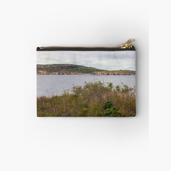 Item preview, Coastal Landscape With Calm Water, Distant Hills, And Lush Green Shoreline Bushes designed and sold by Nmallia.