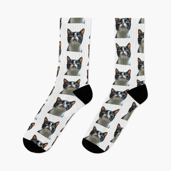 Item preview, Adorable Tuxedo Cat Looking Up Sticker designed and sold by Teewave-Ashish.