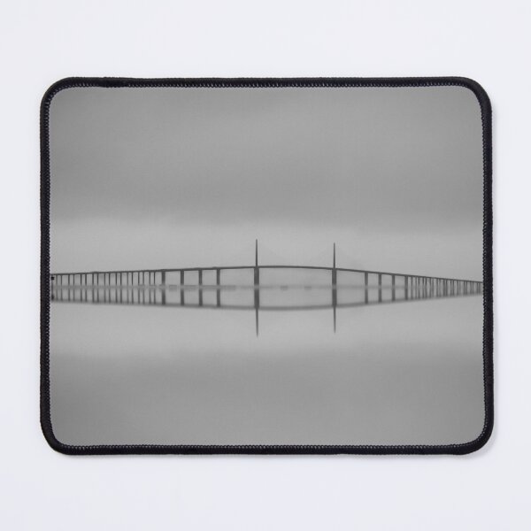 Item preview, Sunshine Skyway Bridge captures the elegance of its sweeping cables beneath a textured, overcast sky designed and sold by EyezWatchin.