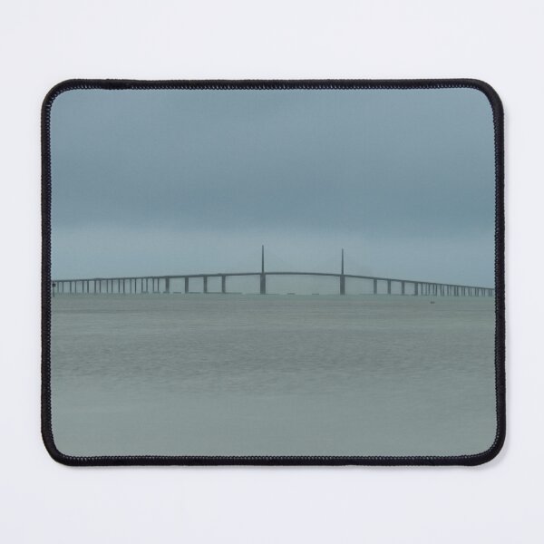 Item preview, Sunshine Skyway Bridge captures the elegance of its sweeping cables beneath a textured, overcast sky designed and sold by EyezWatchin.