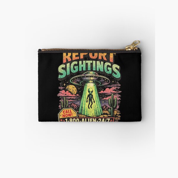 Item preview, Report Sightings UFO Hotline Shirt – 90s Alien Abduction Graphic Tee – Vintage Desert UFO Warning Design designed and sold by JonelCrafts.
