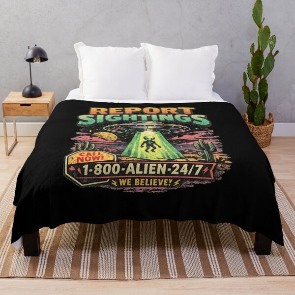Item preview, Report Sightings UFO Hotline Shirt – 90s Alien Abduction Graphic Tee – Vintage Desert UFO Warning Design designed and sold by JonelCrafts.