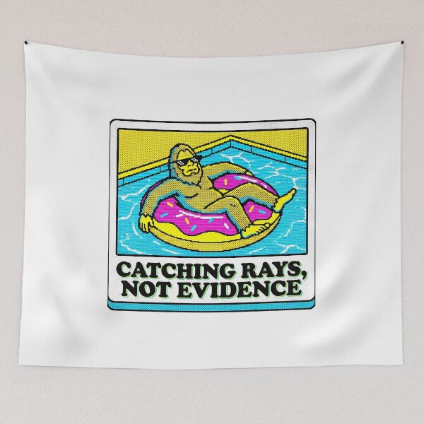 Item preview, Catching Rays Not Evidence Funny Bigfoot Shirt Retro Pool Summer Sasquatch Gift designed and sold by Trending Fashions.