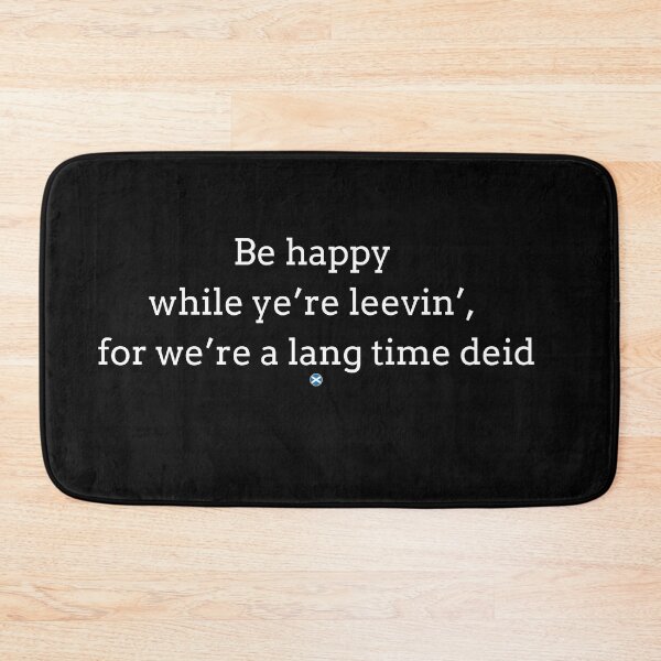 Item preview, Scots language- Scottish traditional saying - "Be happy while ye're leevin', for ye're a lang time deid" designed and sold by WanderingBeach7.