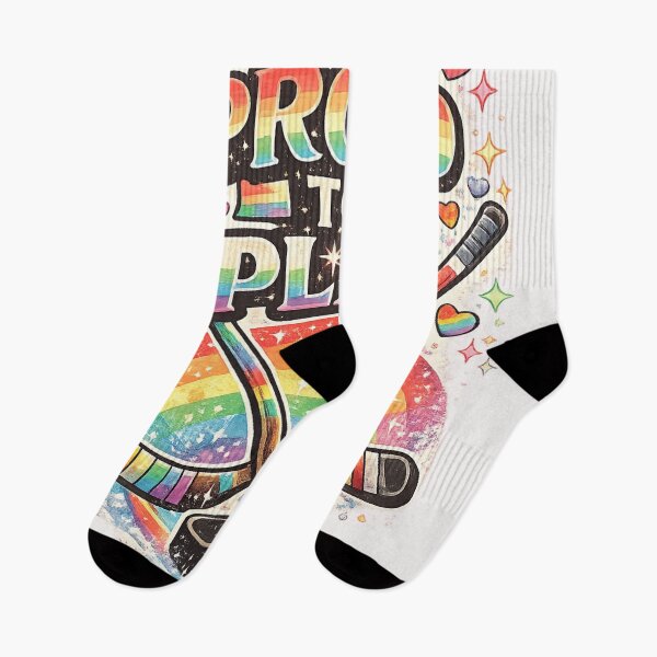 Item preview, Proud to Play – LGBTQ+ Pride Hockey Graphic Tee designed and sold by Dollette Heaven.