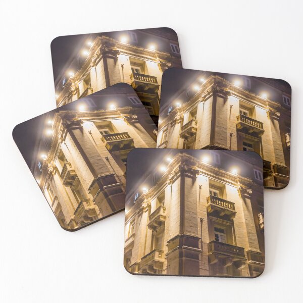 Item preview, Illuminated Historic Building Facade With Balconies And Ornate Architecture At Night On Street designed and sold by Nmallia.