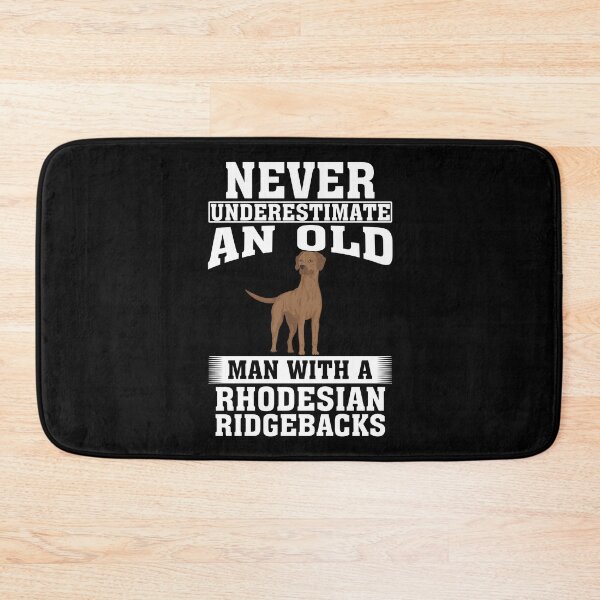 Item preview, Never Underestimate an Old Man with Rhodesian Ridgebacks designed and sold by CosmoKitsch.