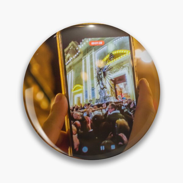 Item preview, Person Capturing Large Night Crowd At Decorative City Event On Smartphone With Festive Lighting And Architecture designed and sold by Nmallia.